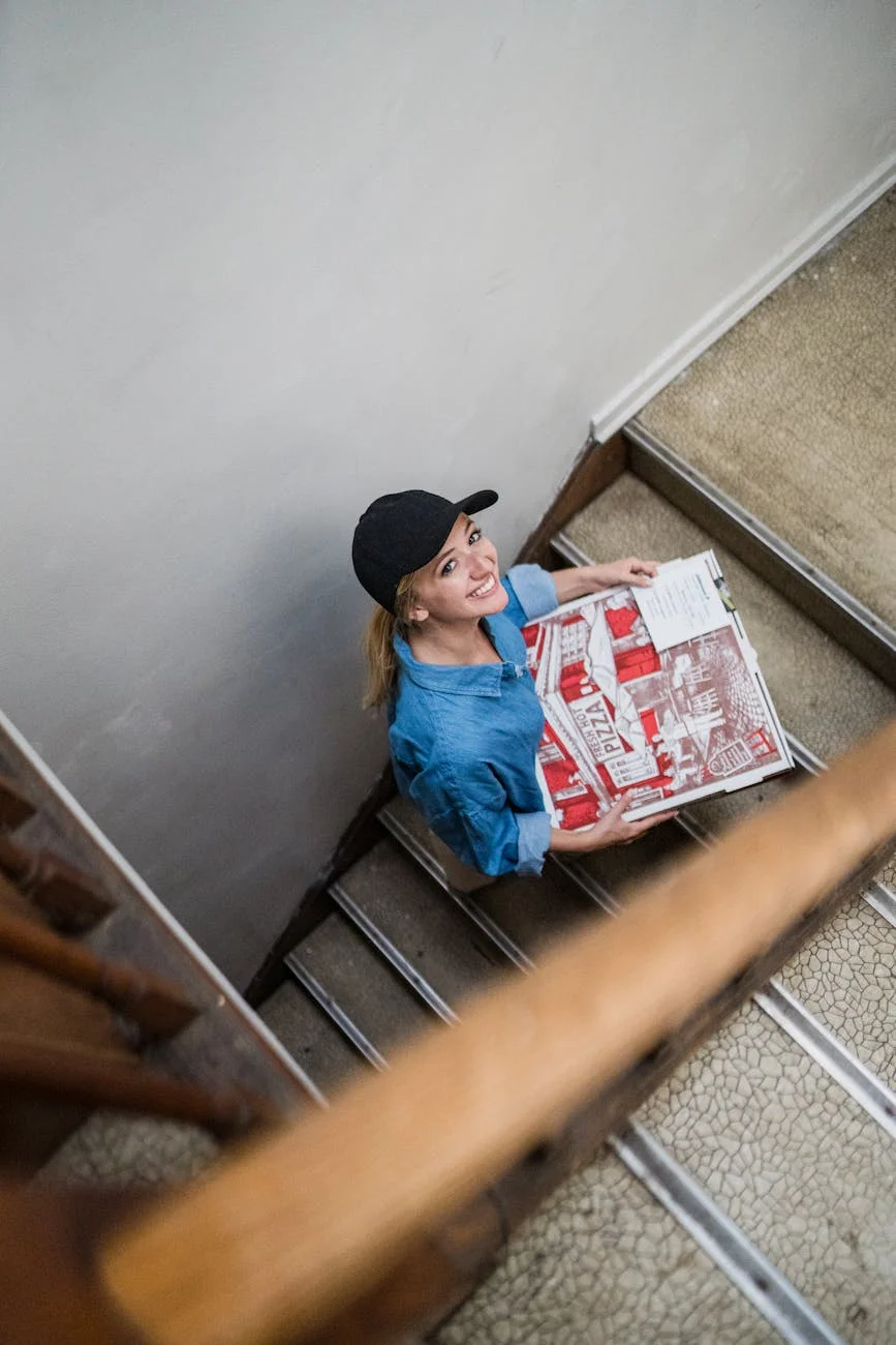 delivery woman at staircase