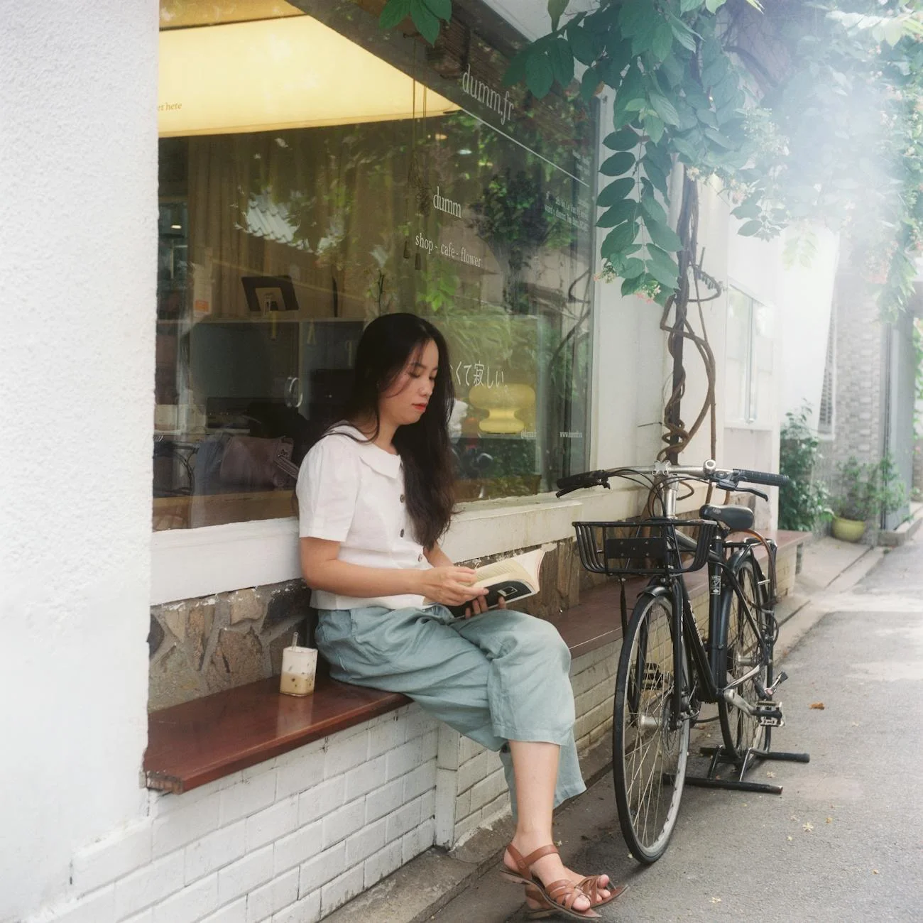 brunette reading book