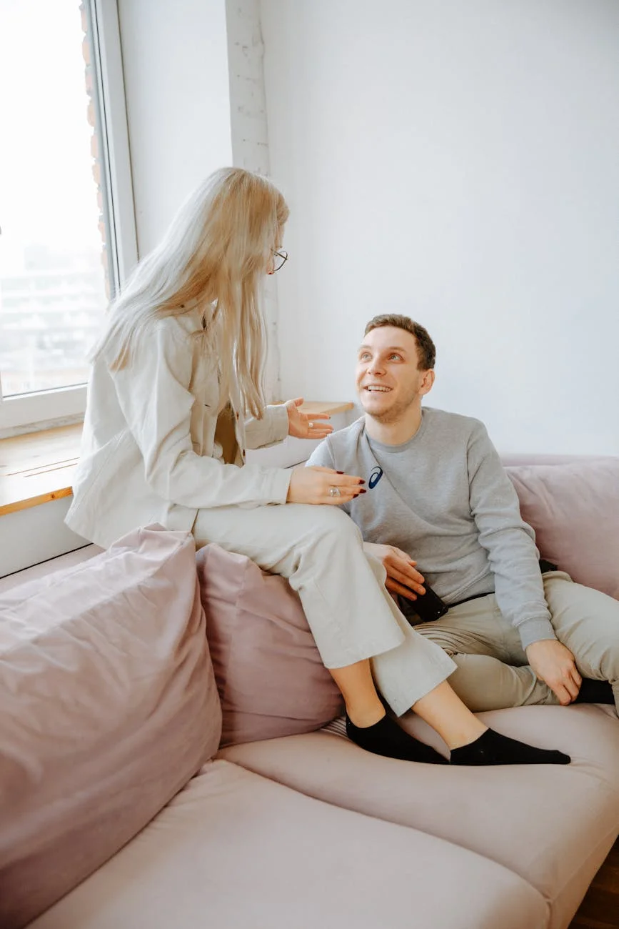 couple talking on couch