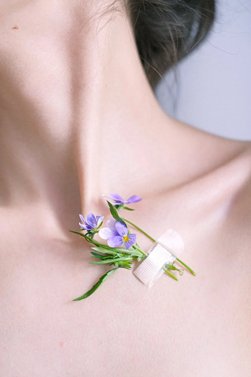 delicate blue pansy flowers attached to woman neck with band aid