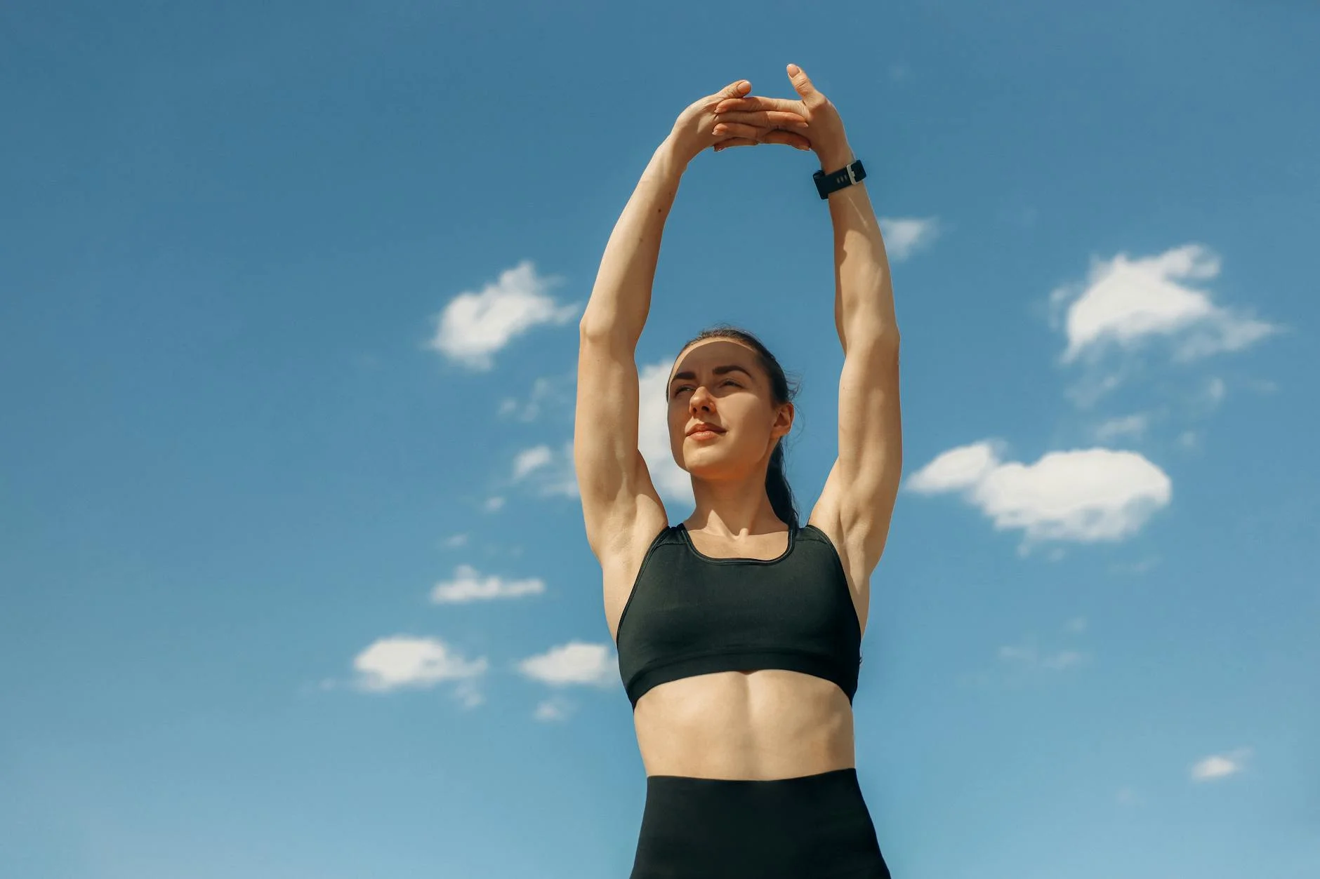 woman stretching her arms