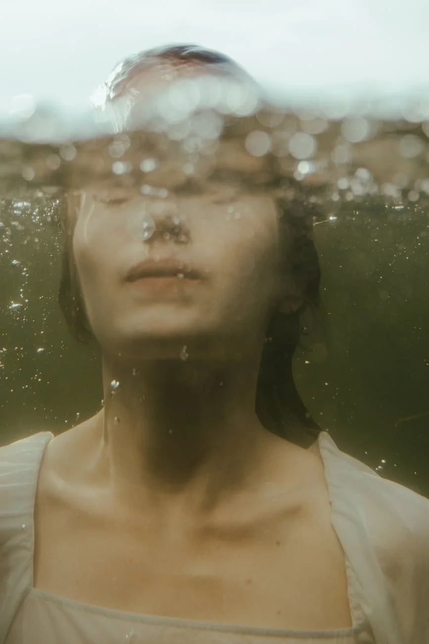 photo of a woman s neck underwater