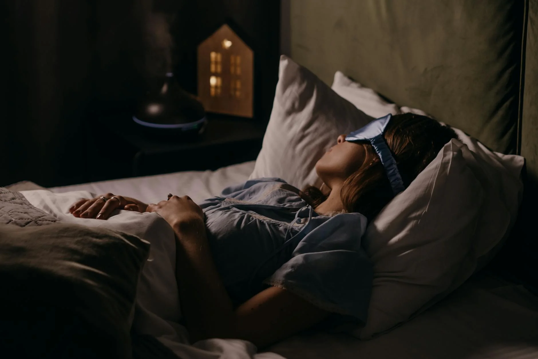 asleep woman wearing eye mask