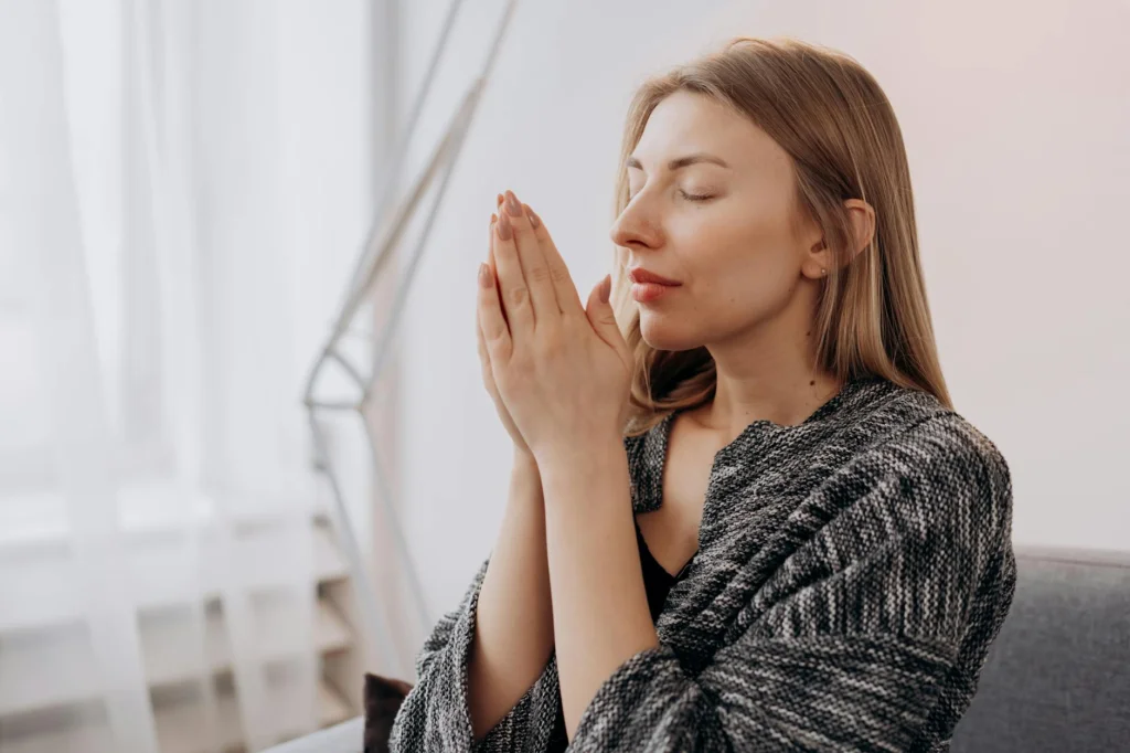 woman meditating in close up view