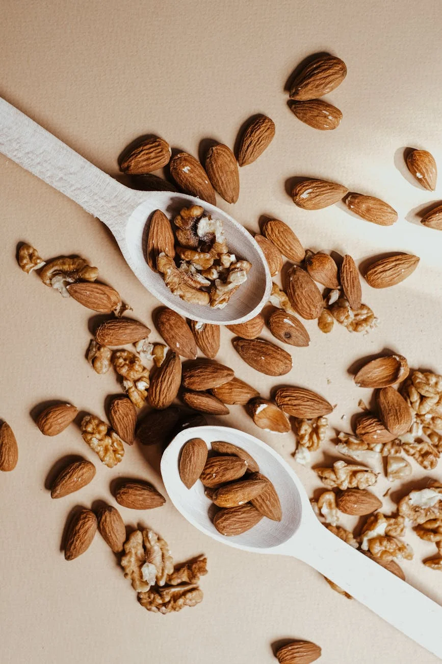 wooden spoon with brown nuts