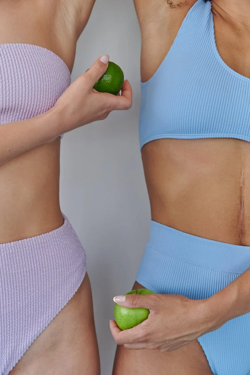 female bodies in bikinis and with fruit