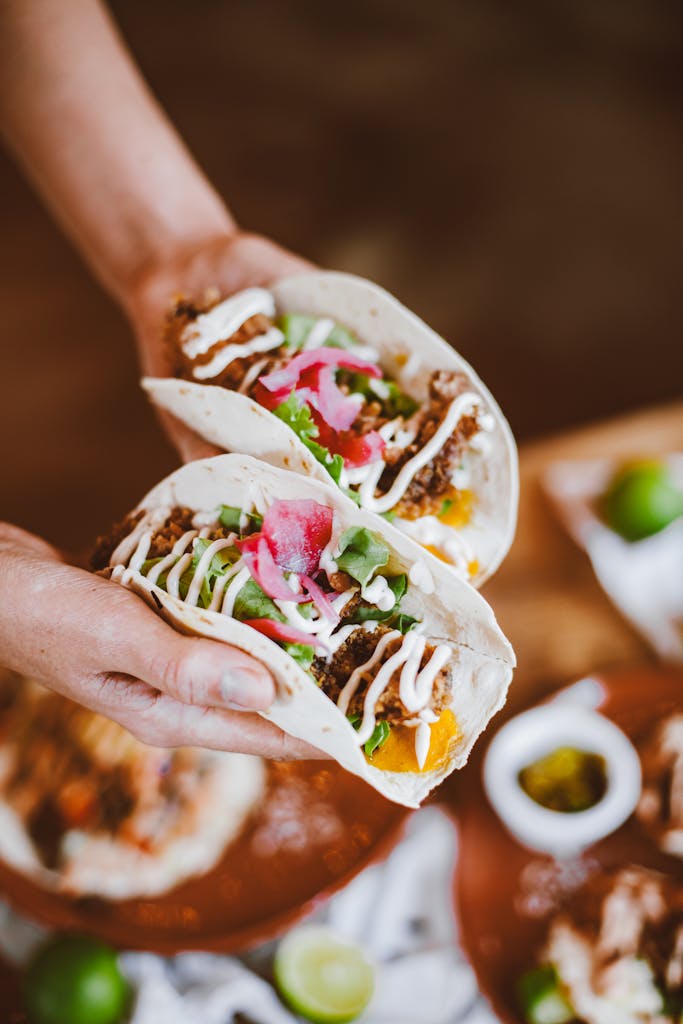 Close-up of flavorful beef tacos with fresh toppings, perfect for a tasty meal.