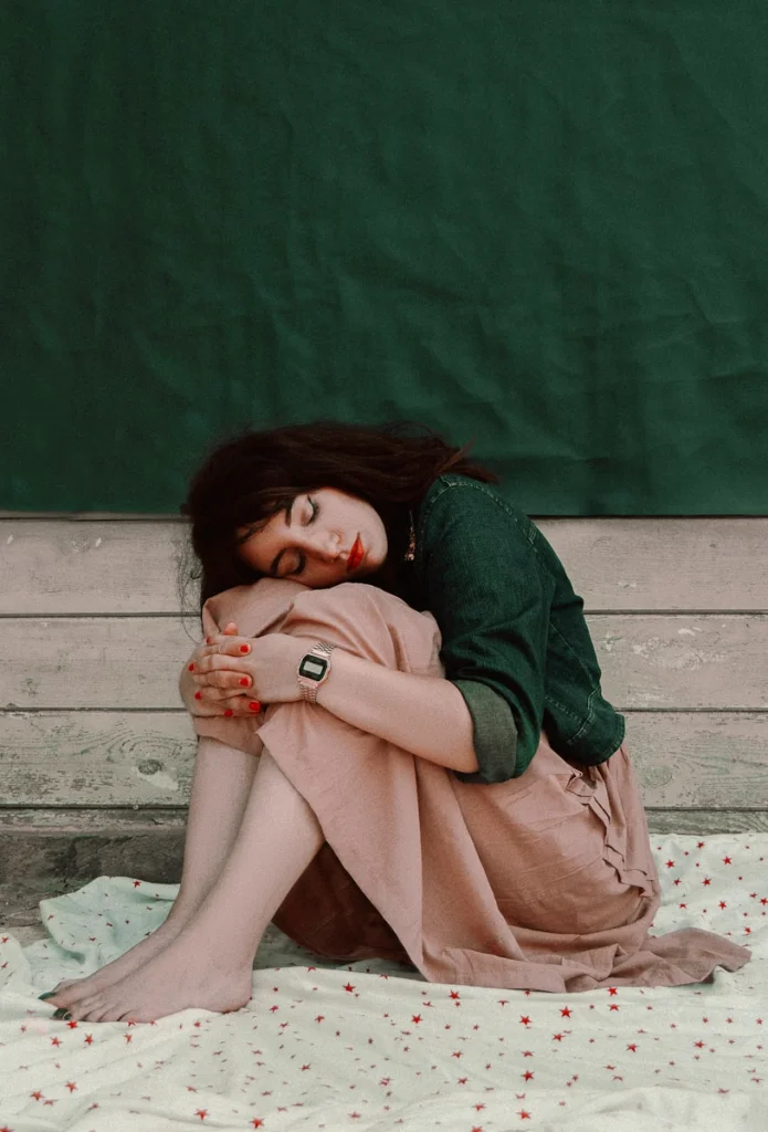 woman sitting on floor