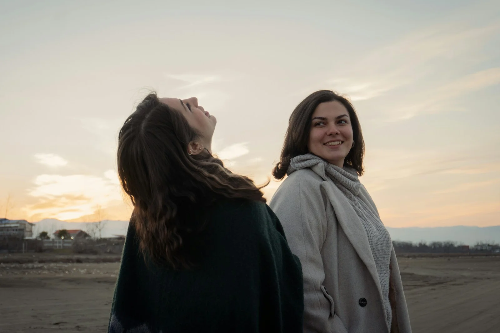 a couple of women standing next to each other
