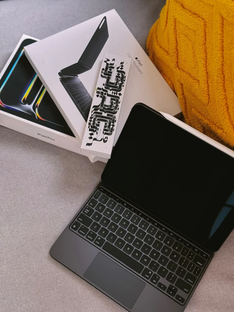 A laptop computer sitting on top of a table