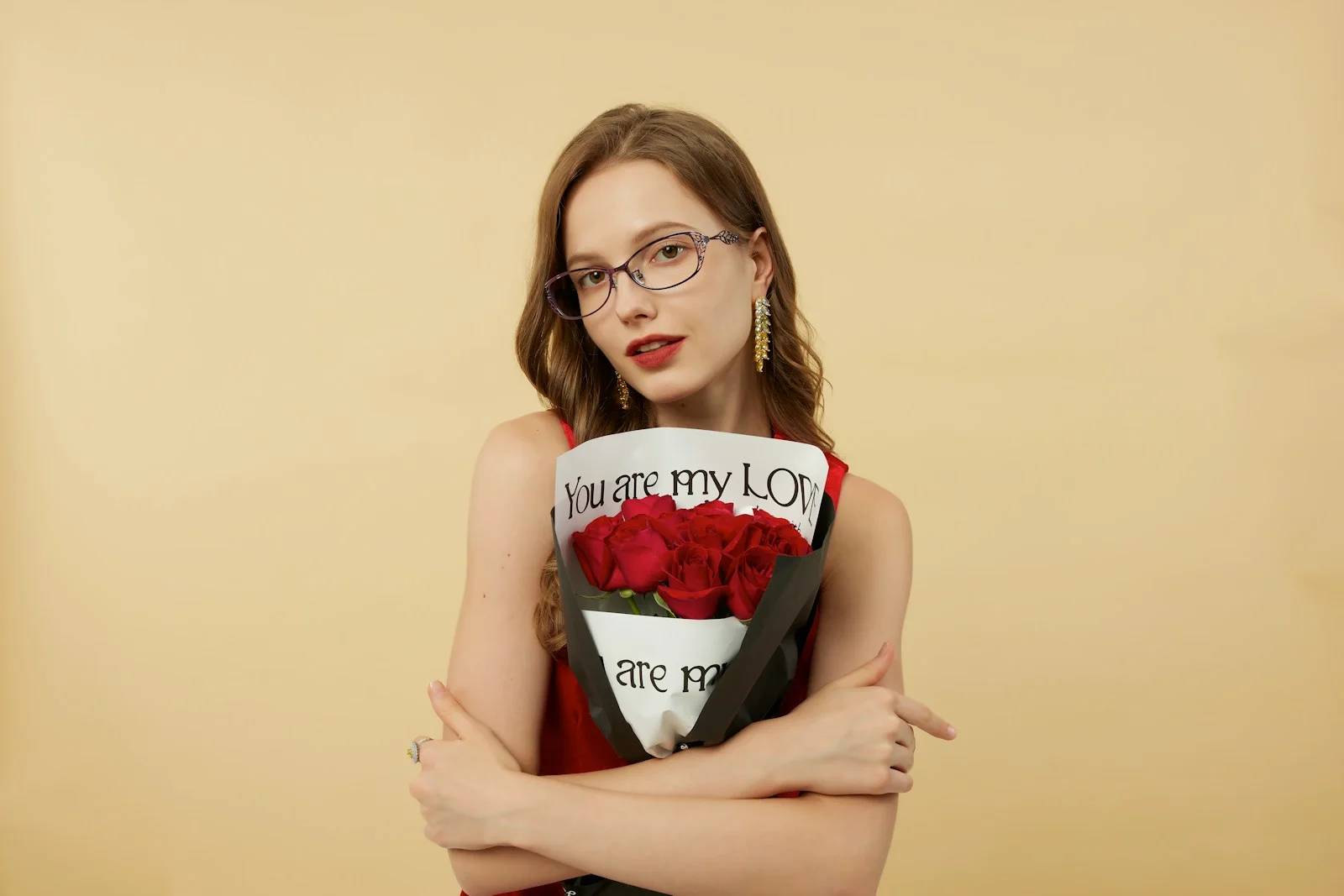 Woman holds roses, saying "you are my love."