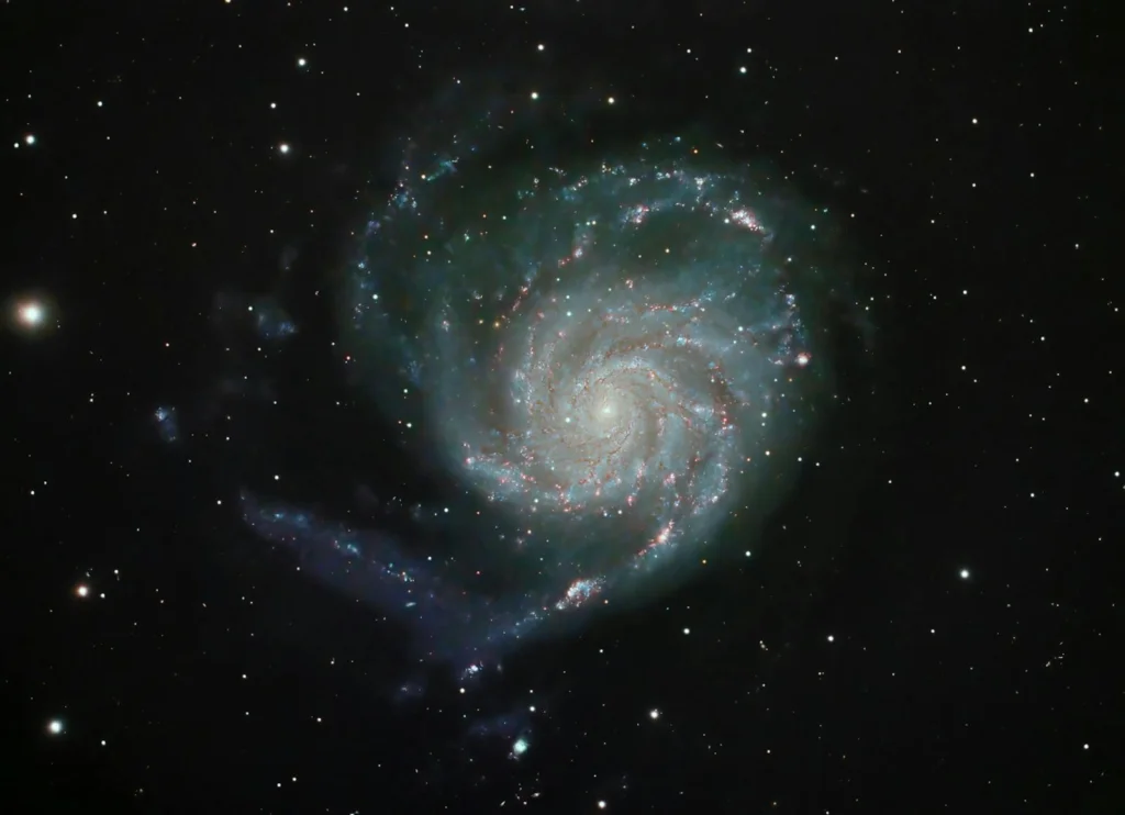 Beautiful view of the Pinwheel Galaxy M101 showcasing cosmic spirals and stars.
