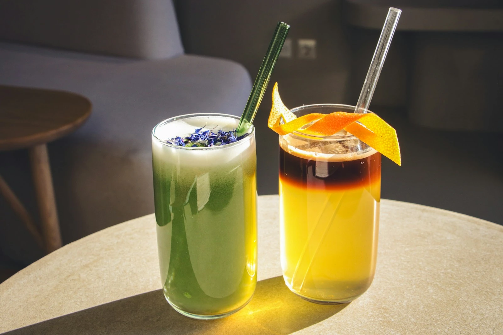 a couple of drinks sitting on top of a table