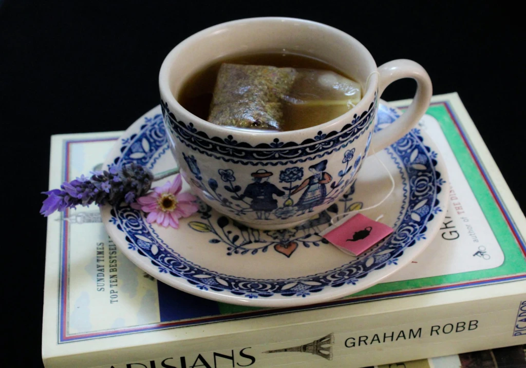 a cup of coffee on a book