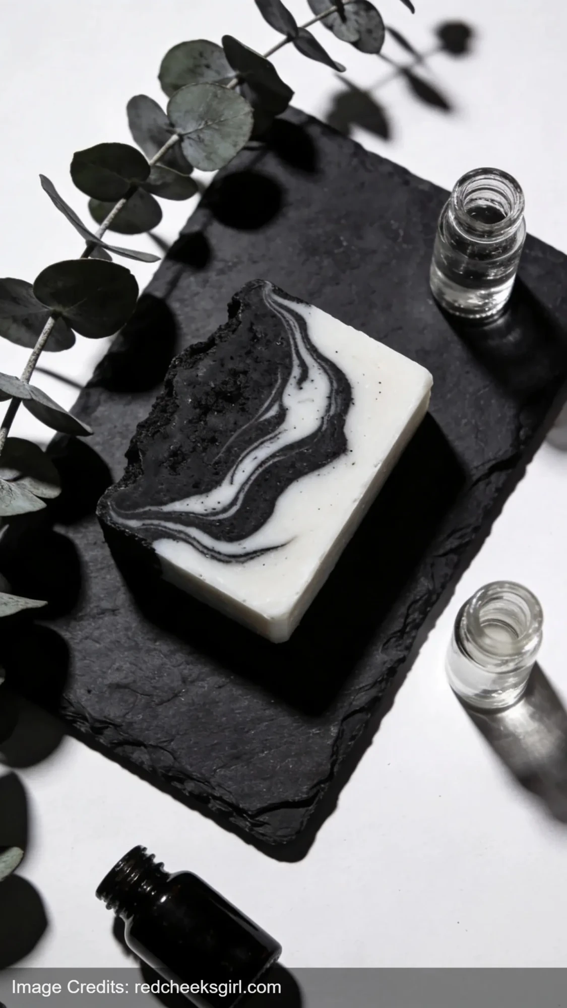 handmade charcoal and tea tree detox soap bar with black and white swirl pattern