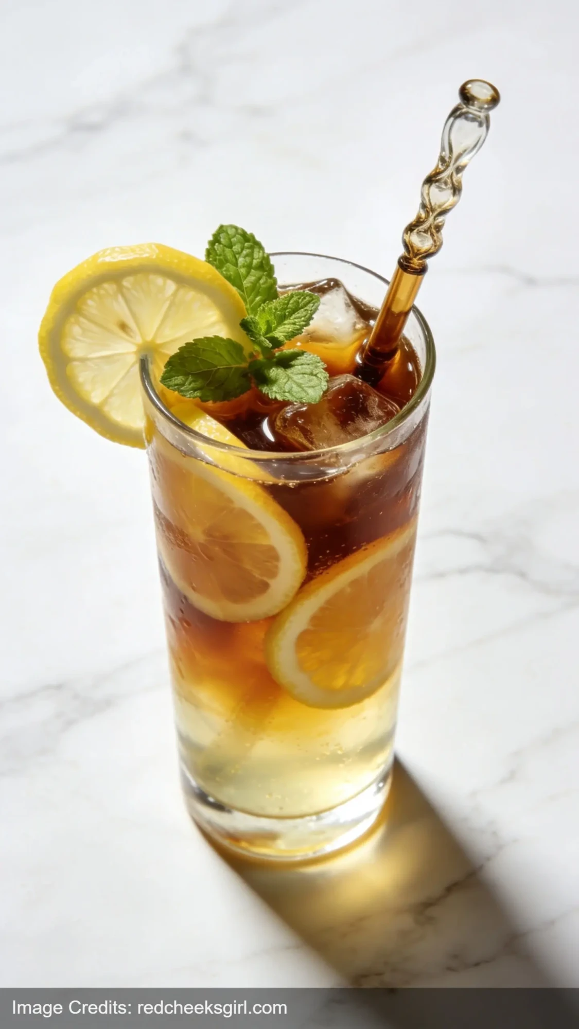 coffee lemonade with ice and fresh lemon garnish