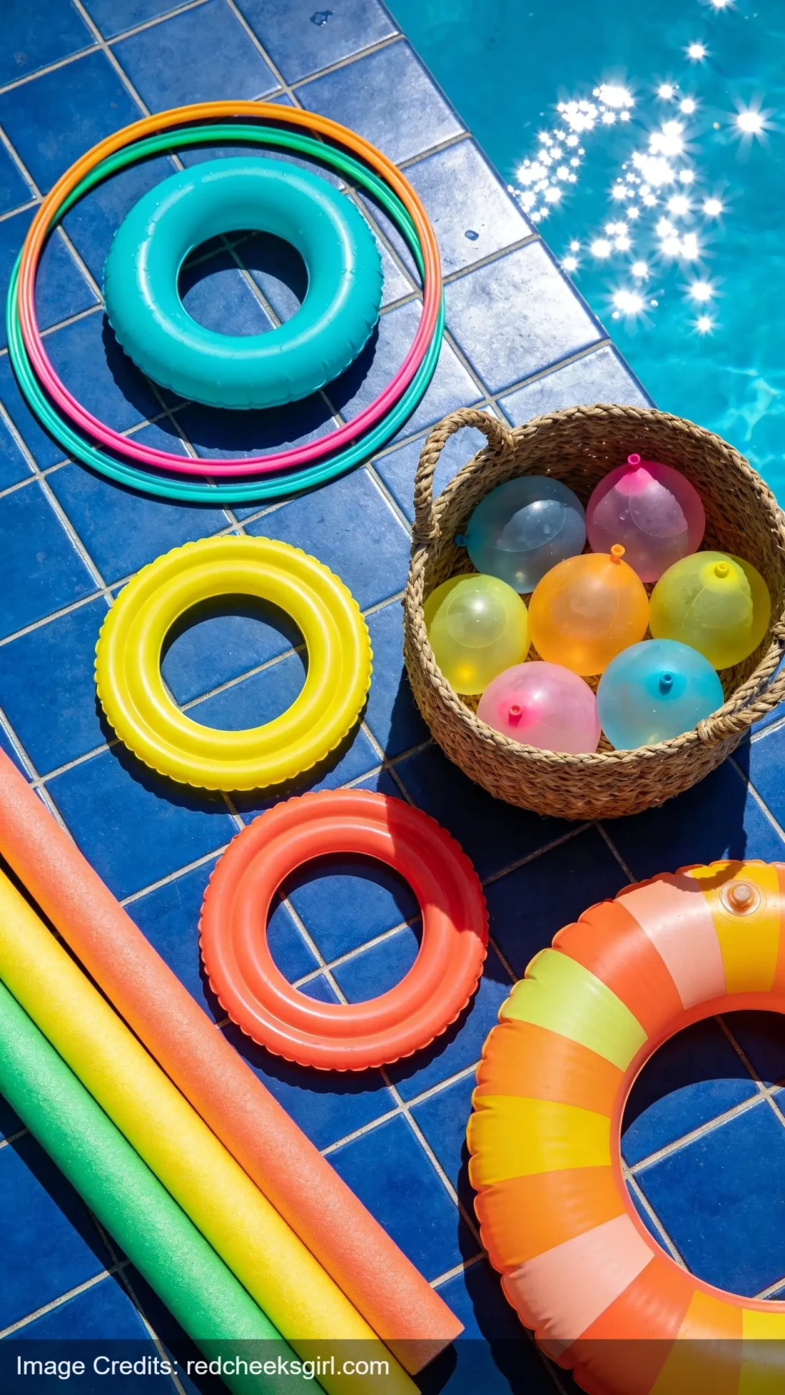 pool party games and water toys arranged for kids birthday celebration