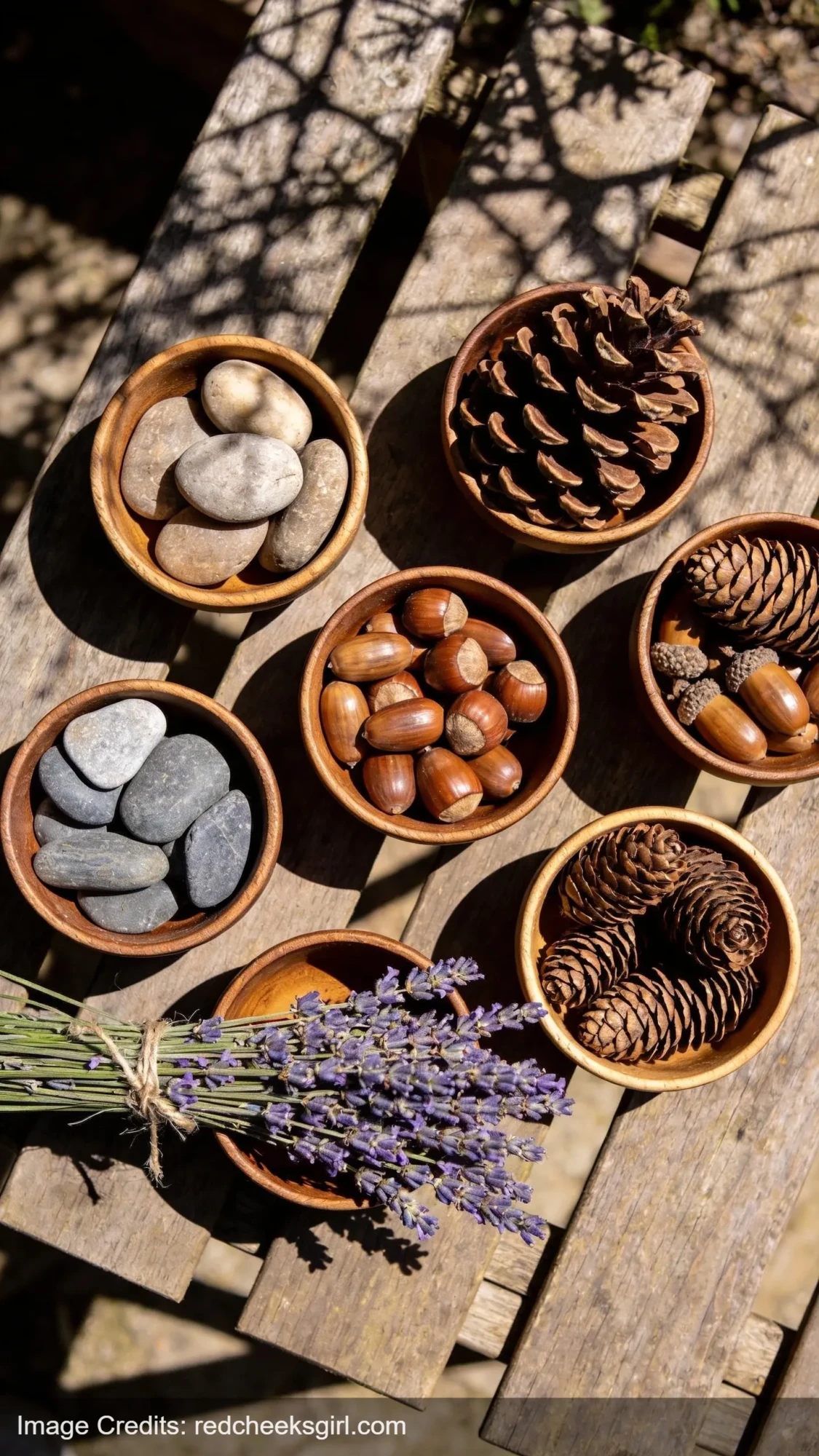 Natural loose parts like stones, acorns and lavender for mud kitchen play
