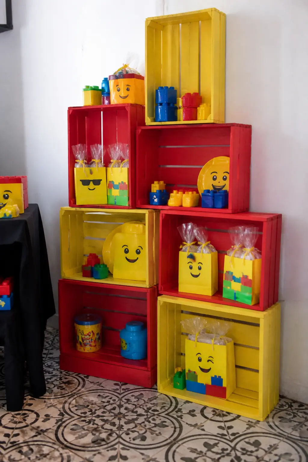 Yellow and Red Painted Wooden Crates as Display Shelves