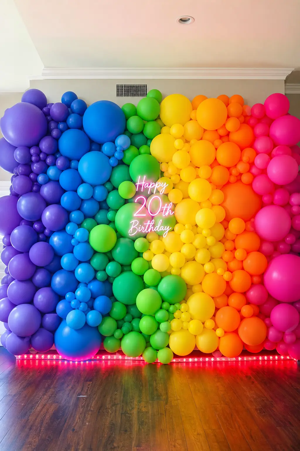 Neon Monochrome Dress Code Party — Each guest gets assigned one saturated color to wear head to toe, then stands in front of a rainbow balloon wall for the