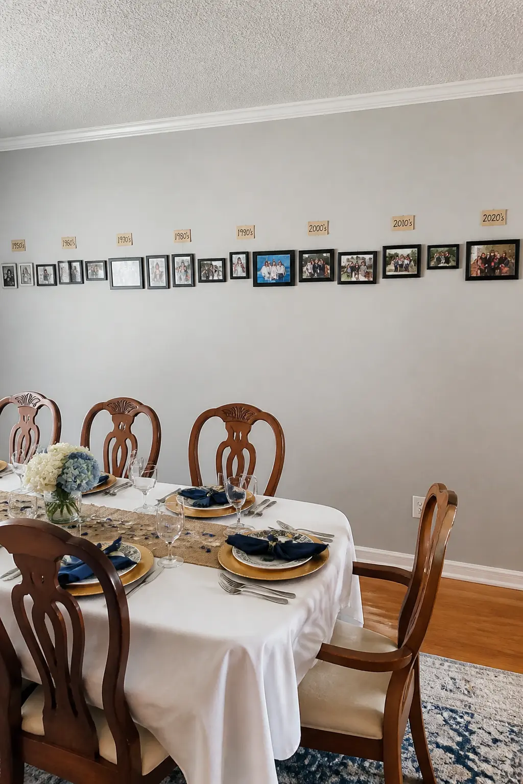 Photographs of Seventy Years Along One Wall