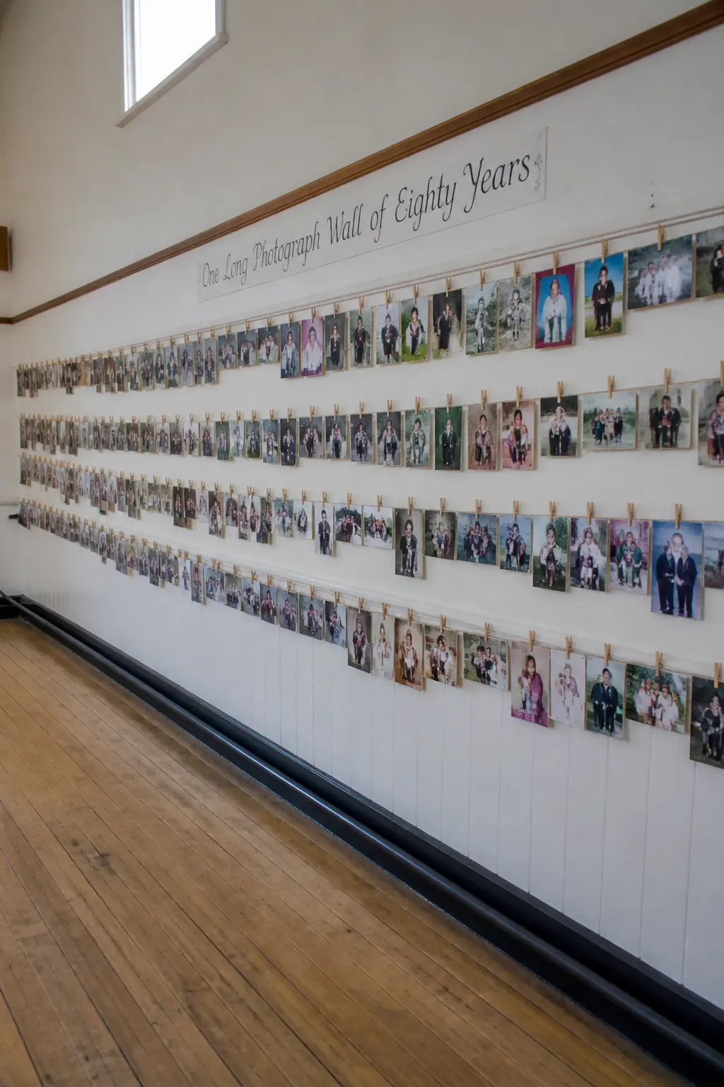 One Long Photograph Wall of Eighty Years