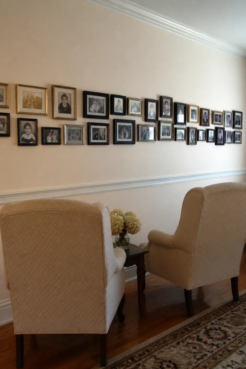 Photographs of Ninety Years Along One Wall