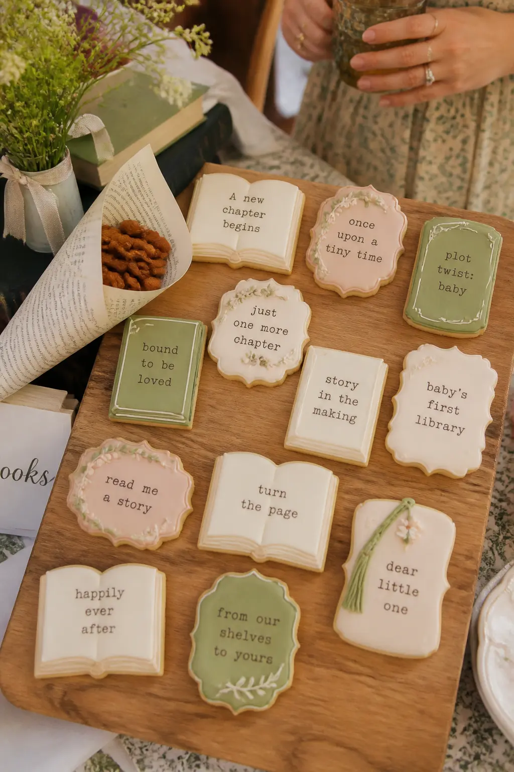 Book Chapter Cookie Set — Order or make rolled sugar cookies iced in cream, sage, and blush, decorated with small typewriter-font text like "chapter one," a