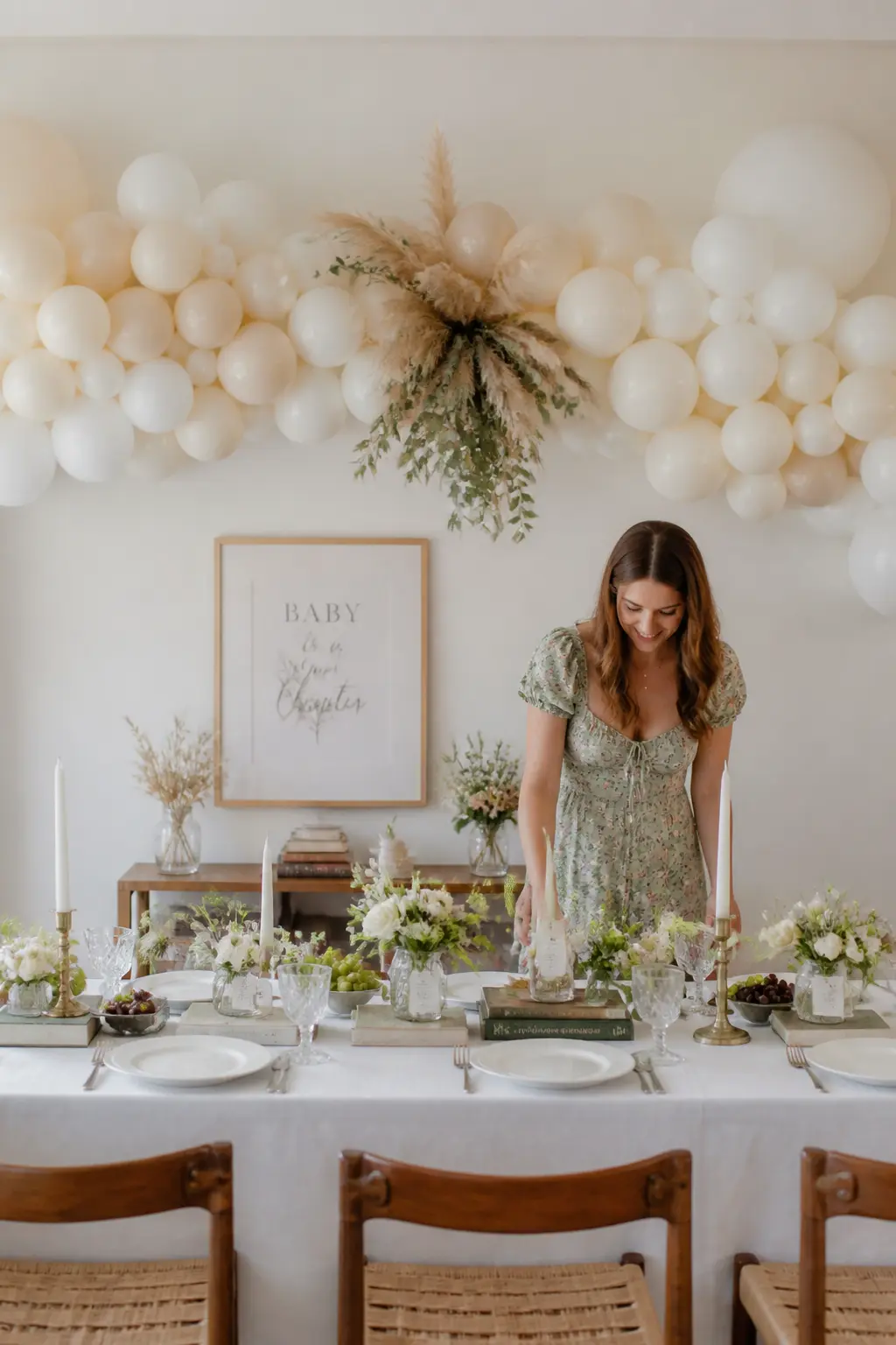 Organic Cream and Ivory Balloon Garland Backdrop — Build a horizontal garland of cream, ivory, and off-white balloons in mixed sizes across the back of the