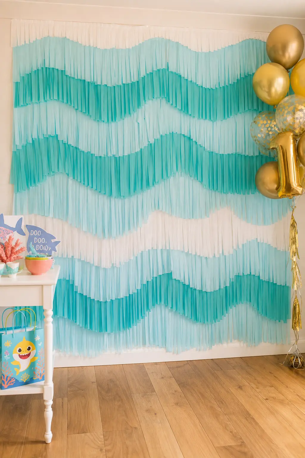 Fringe Wave Curtain Wall — A curtain of white and turquoise fringe, hung floor to ceiling, does the ocean-movement thing without a single cutout fish. Baby