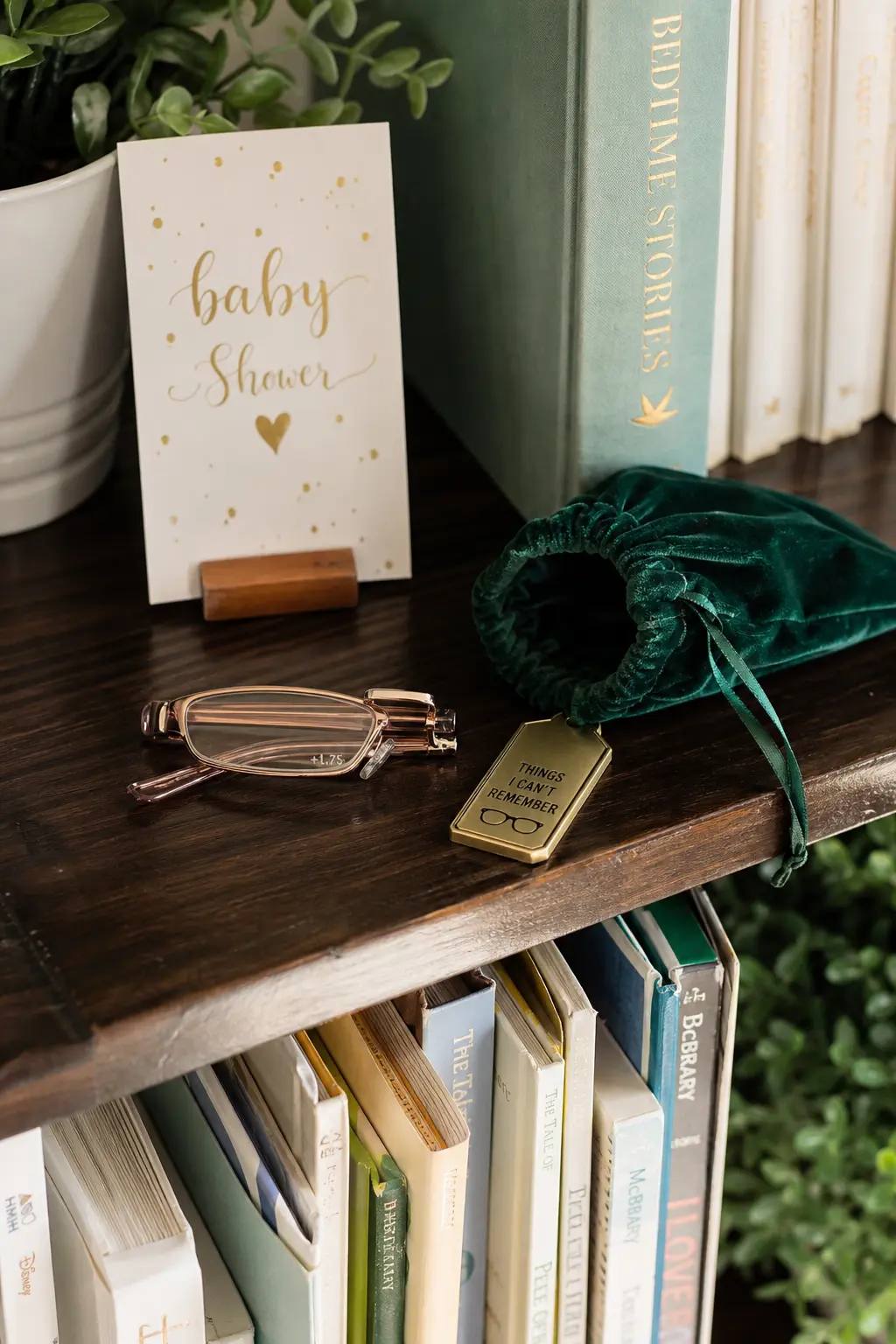Folding Reading Glasses in a Velvet Pouch — Foldable reading glasses in a couple of strengths solve a real problem at the party itself, since someone always