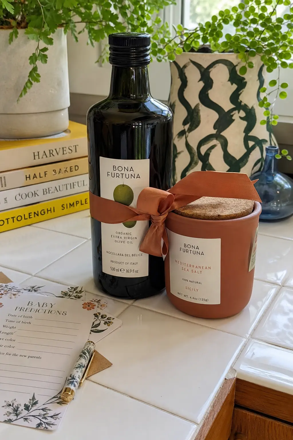 Good Olive Oil and Flaky Sea Salt — A small bottle of good olive oil next to a tin of flaky sea salt is the kind of upgrade a lot of women want in their