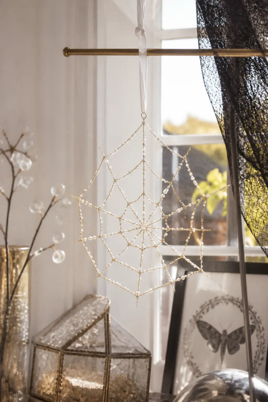 Champagne Gold and Pearl Window Web — Champagne gold metallic seed beads form the spokes and 3mm ivory glass pearls fill every intersection of the spiral