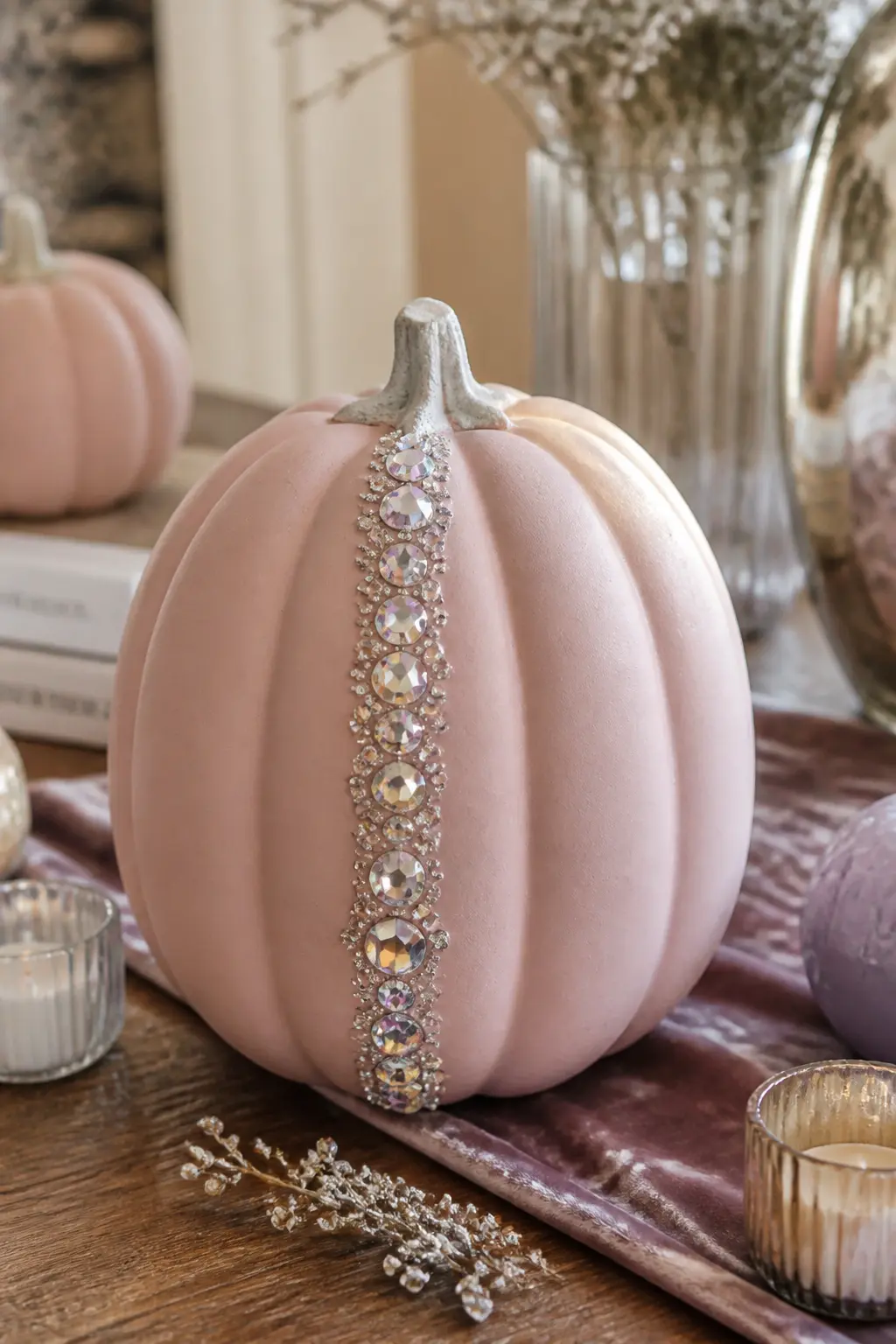 Blush Pumpkin with a Jewelled Stripe — A single vertical stripe of mixed gems runs from the base of the stem to the bottom of a blush-painted pumpkin