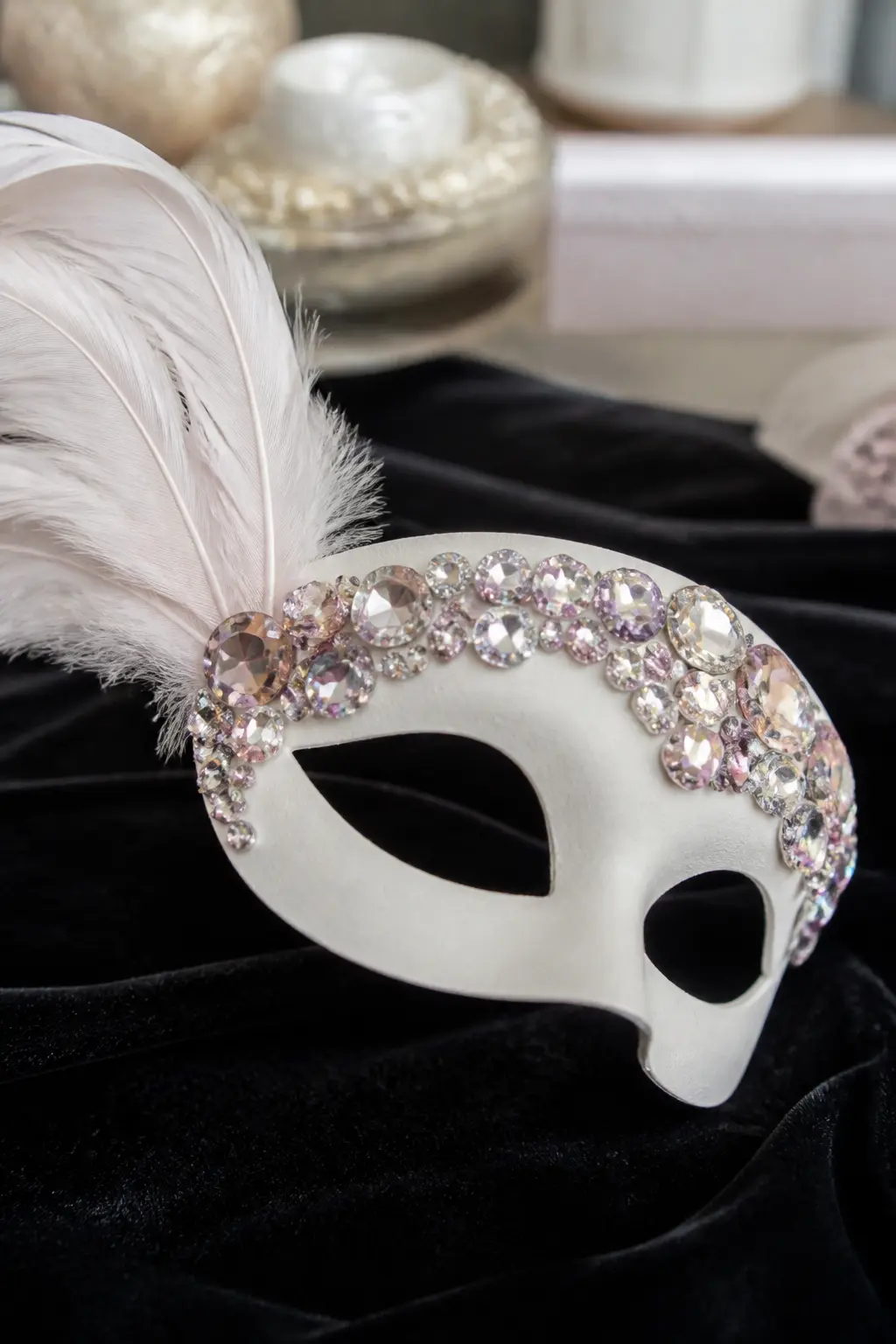 Jewelled Masquerade Mask — A plain white or black masquerade mask, the flat Venetian kind rather than a moulded full-face version, becomes a serious piece of