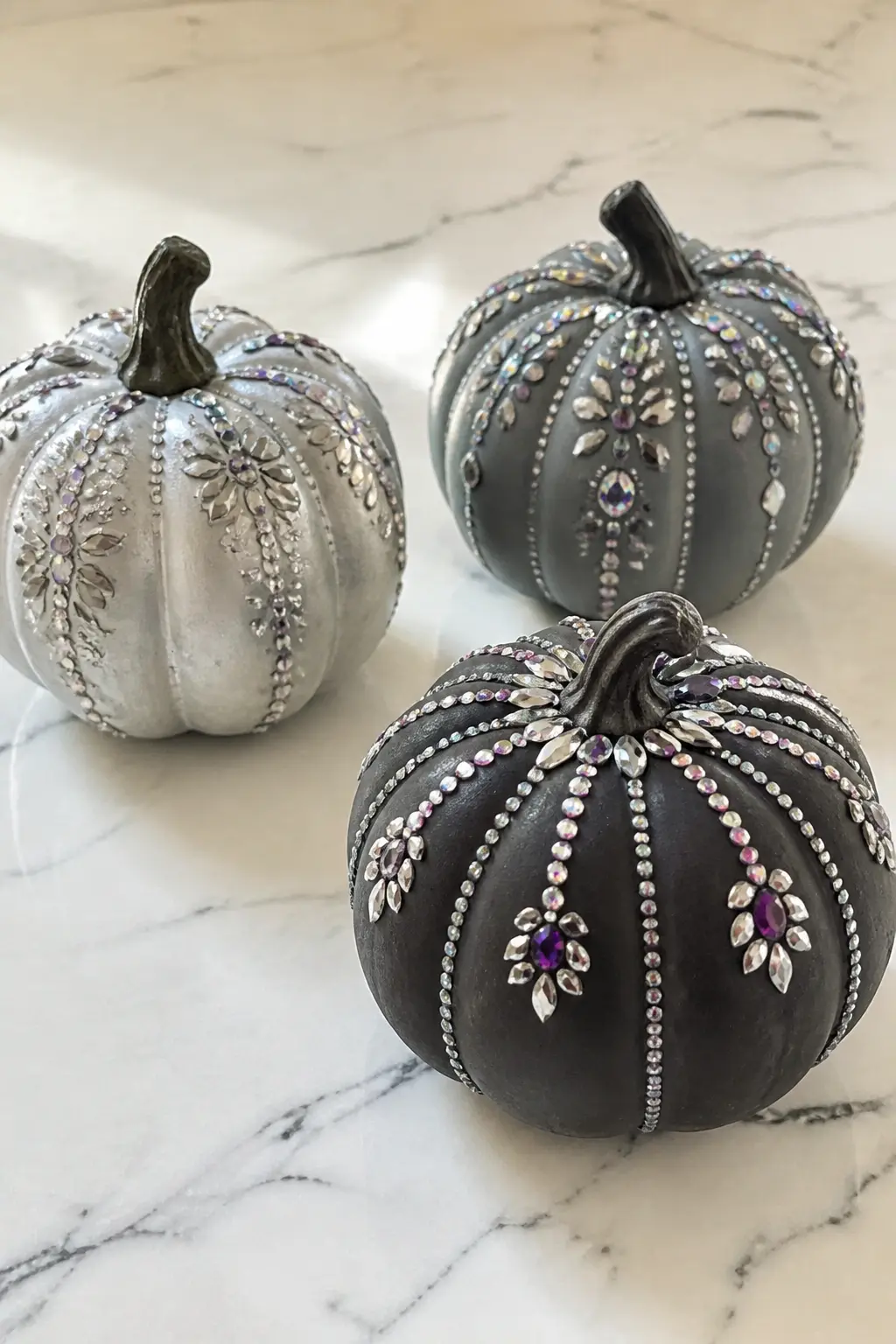 Mini Pumpkin Trio in Silver and Smoke — Three mini faux pumpkins painted in slightly different tones, pale silver, warm stone and deep charcoal, sit together