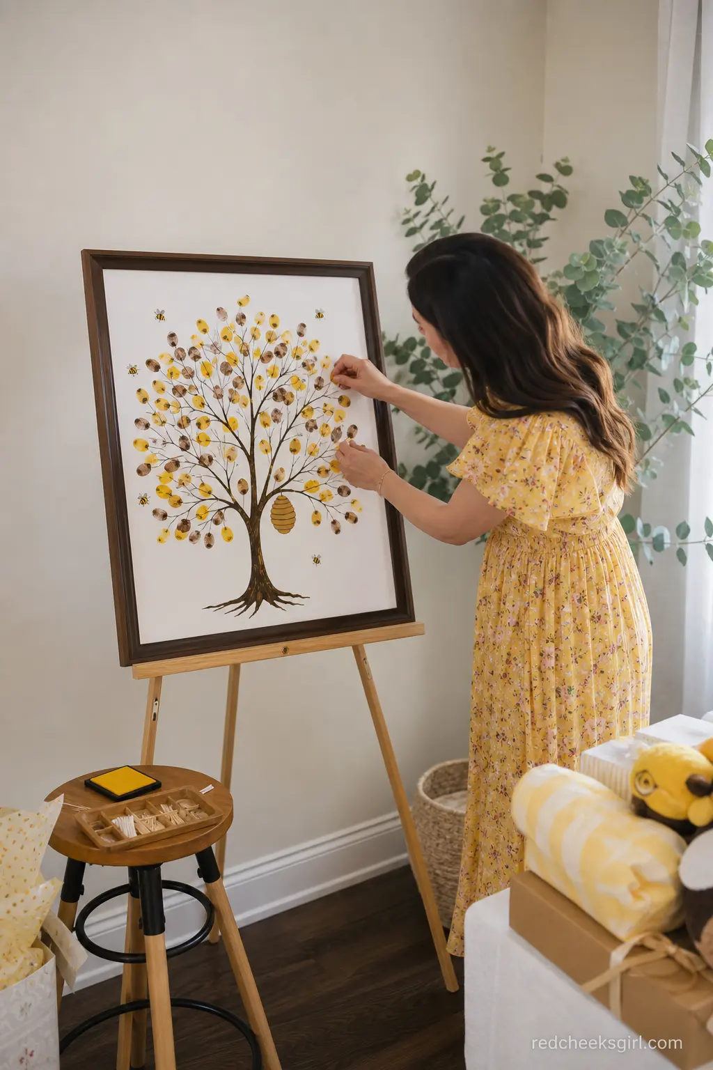 Beehive Fingerprint Guest Book Frame — A fingerprint tree print gives guests a reason to stop at one spot for thirty seconds and leaves the parents with