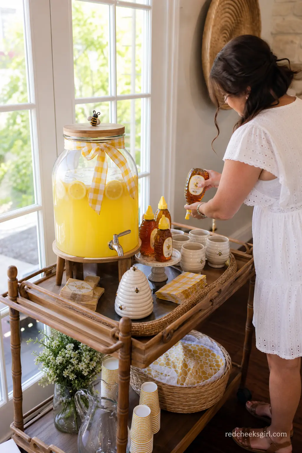 Honey Lemonade Drink Station — A single dispenser of honey lemonade saves you from mixing individual drinks all afternoon and fits the theme without any extra