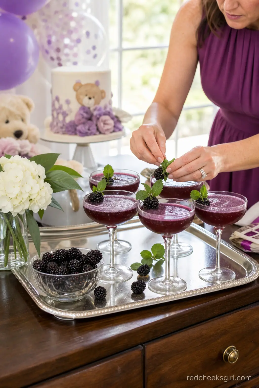 Sparkling Berry Mocktail Station — Deep purple berry mocktails in coupe glasses make the drinks table feel dressed up without a bottle of anything in sight.