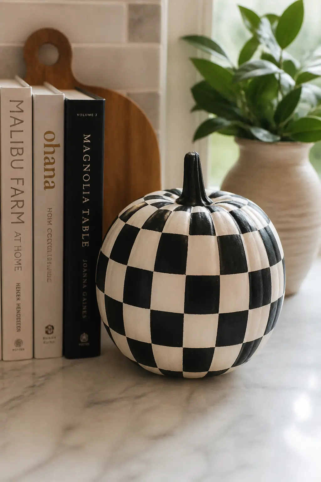 Classic Checkerboard — Base coat in white. Black and white painted pumpkin