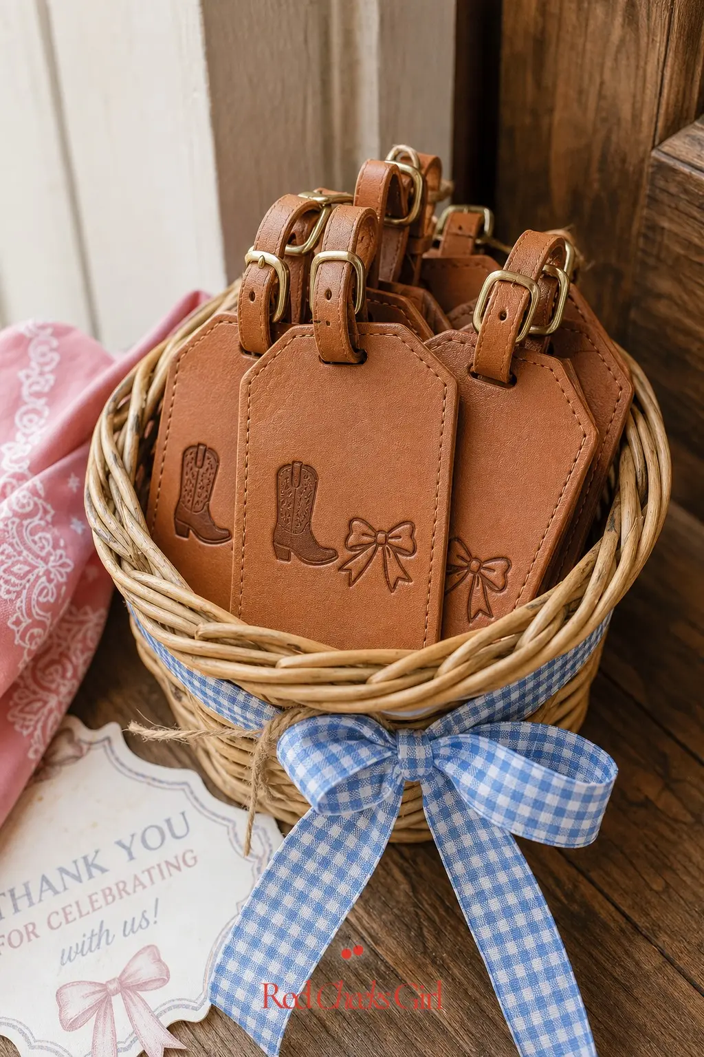 Leather Luggage Tag Favors — A small basket by the door holds personalized leather luggage tags, each stamped with the date and a tiny boot or bow, for guests