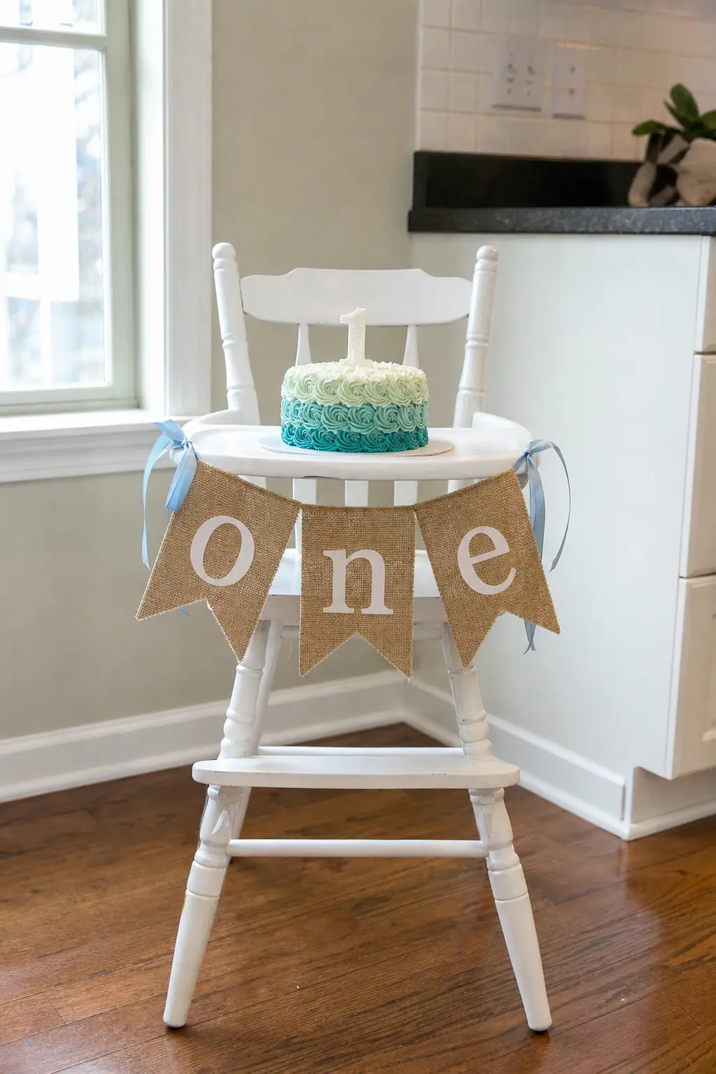 A Highchair Banner as the Party's One Piece of Dedicated Signage