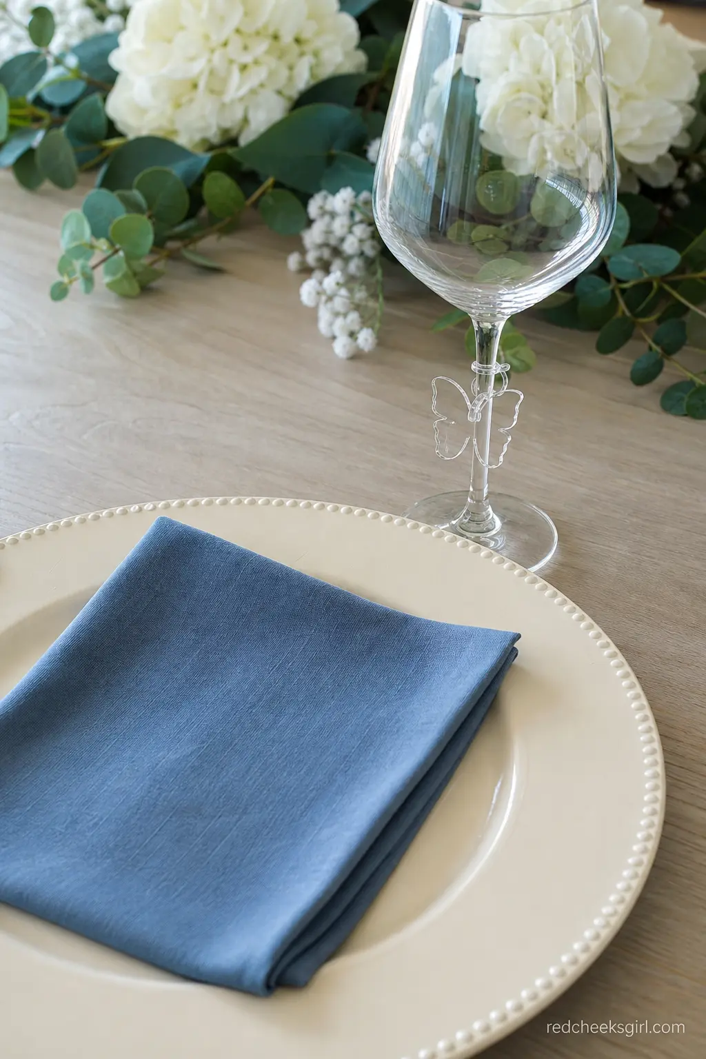 Butterfly Glass Tag Place Setting — A full place setting with a butterfly drink tag looped around the stem of each glass solves two problems at once: it