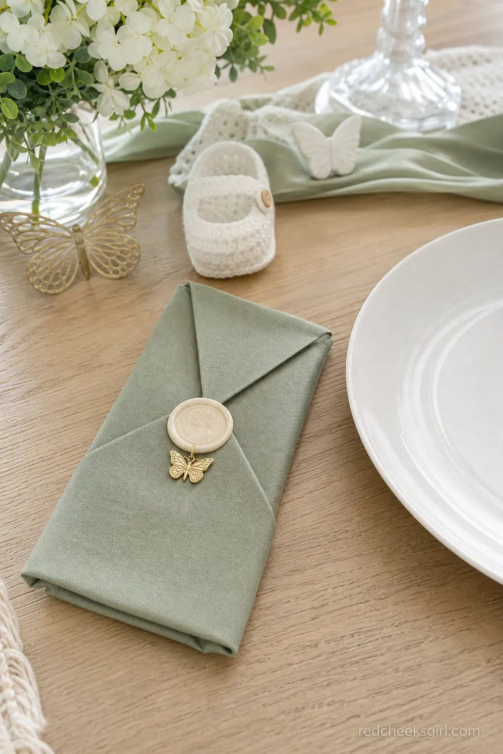 Wax-Sealed Napkin Fold with Butterfly Charm — This one is entirely about the close-up photo. Butterfly baby shower ideas