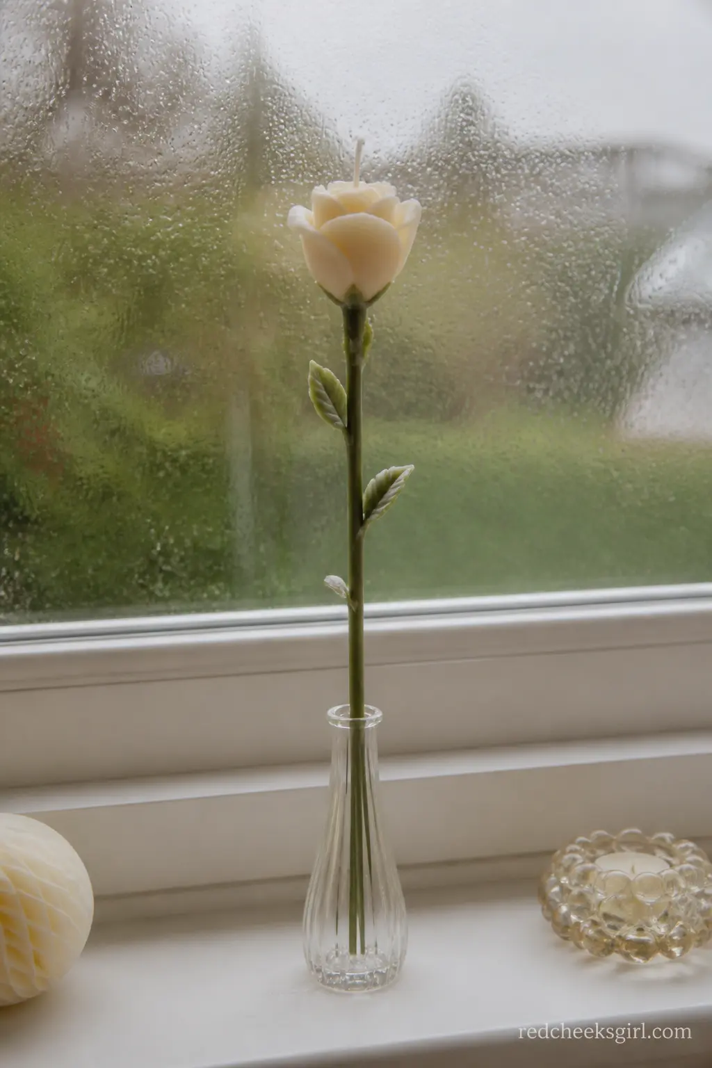 One Good Stem — A single ivory rose candle on one long stem, the smallest gesture on this list and often the one that gets kept longest, since there is nothing