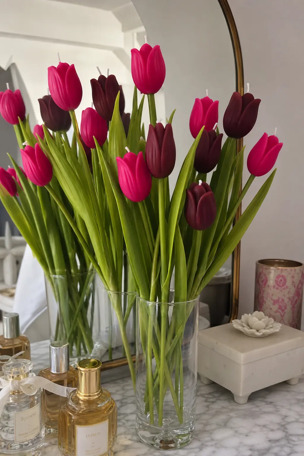 Sweetheart Stems — Tulip-shaped candles in hot pink and burgundy, wired onto long stems so the bouquet stands taller than most, closer to a real tulip bunch