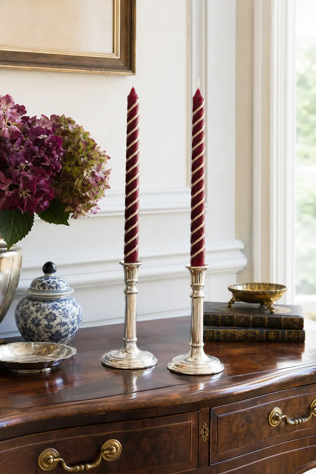 Barber-Pole Spiral Taper — A burgundy taper with a thin cream spiral trailed by hand around the base is a slower, more advanced technique that rewards patience