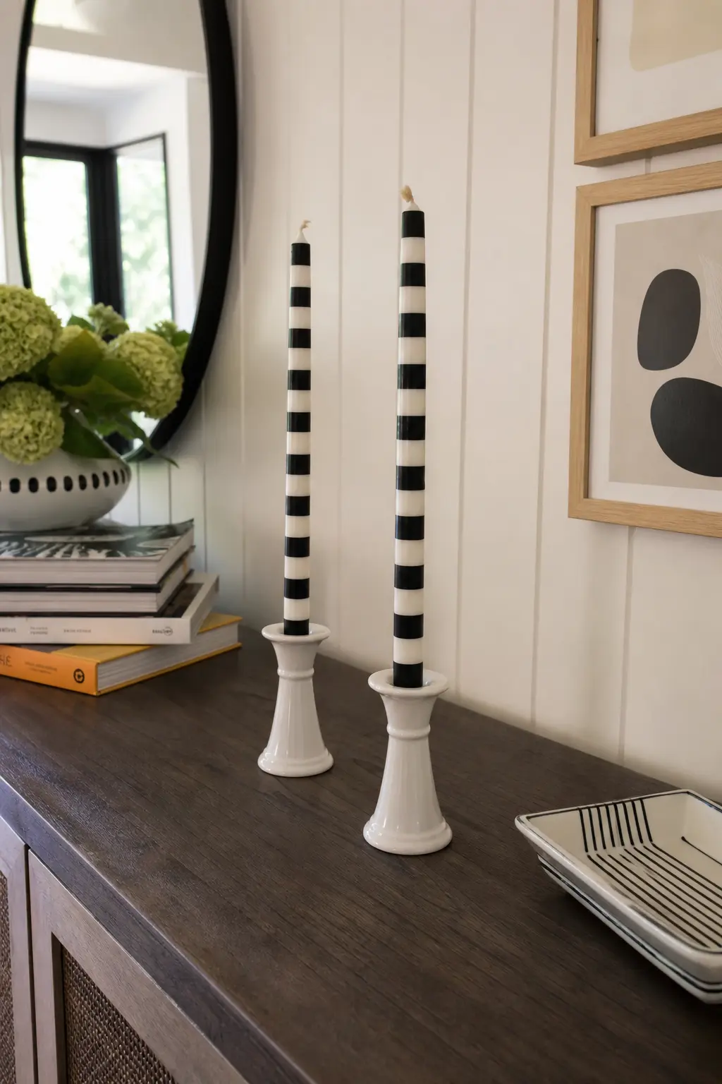 Striped Black and White Taper — Alternating black and white bands down a single taper is a graphic, almost architectural look that suits a pair of plain