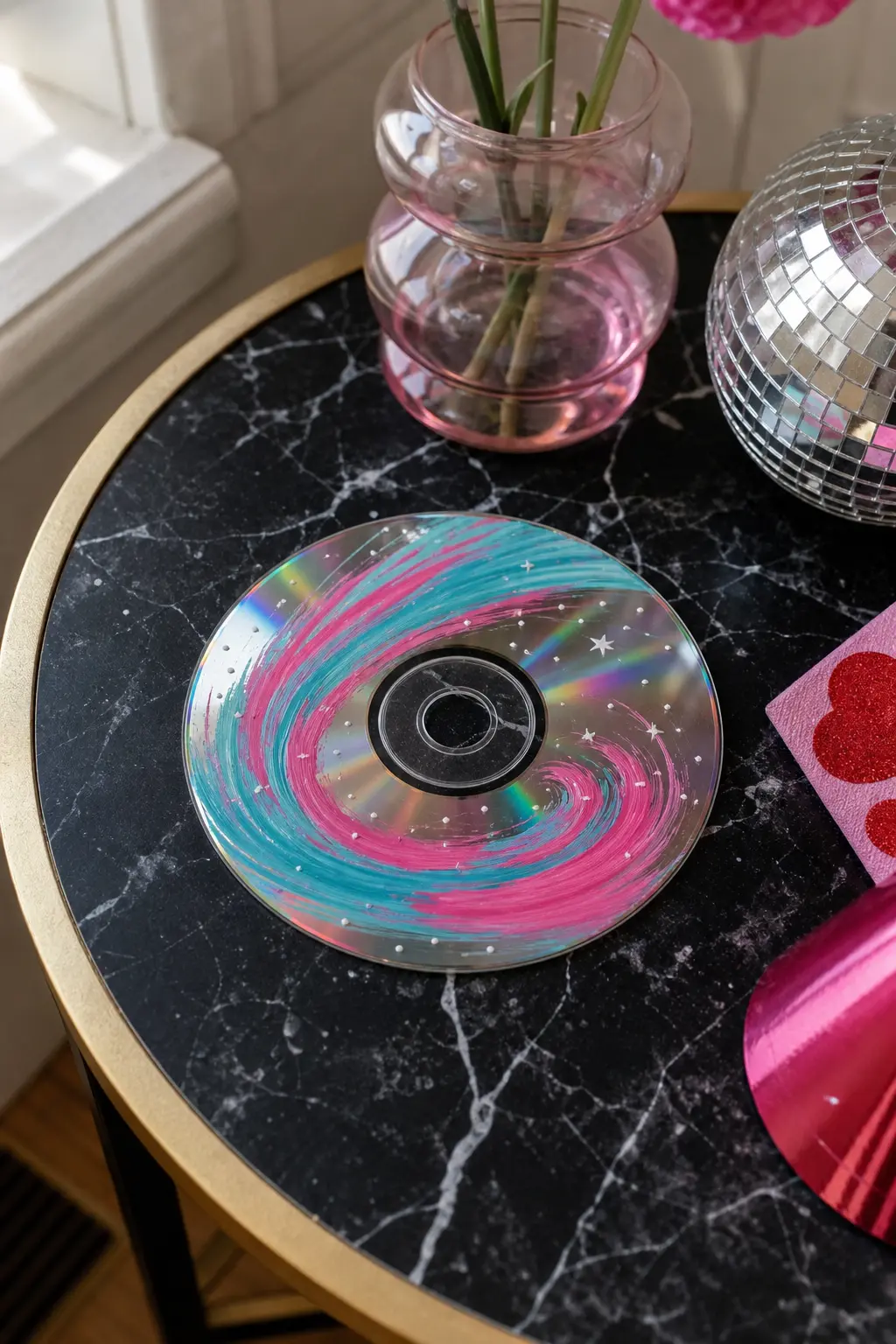 Comet Swirl — One long teal streak curving off toward the edge, tapering into a scatter of hot pink dots, reads instantly as a comet without needing any other