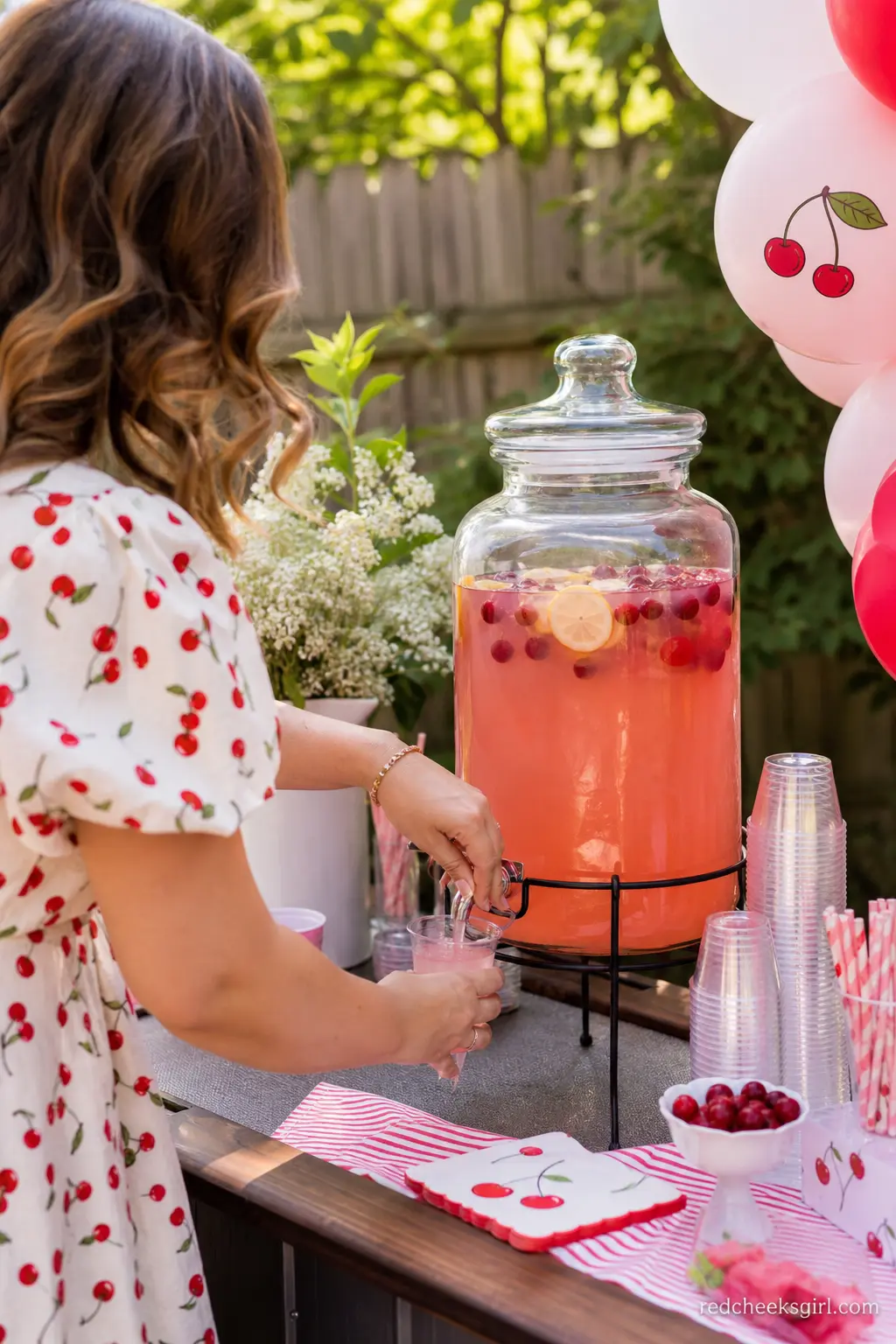 Cherry Lemonade Drink Station — Cherry lemonade, sparkling cherry mocktails, or even cherry-infused water add an extra special touch to the beverage station.